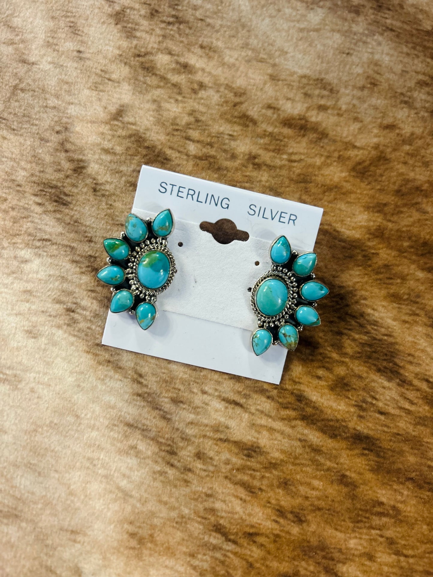 Half cluster earrings