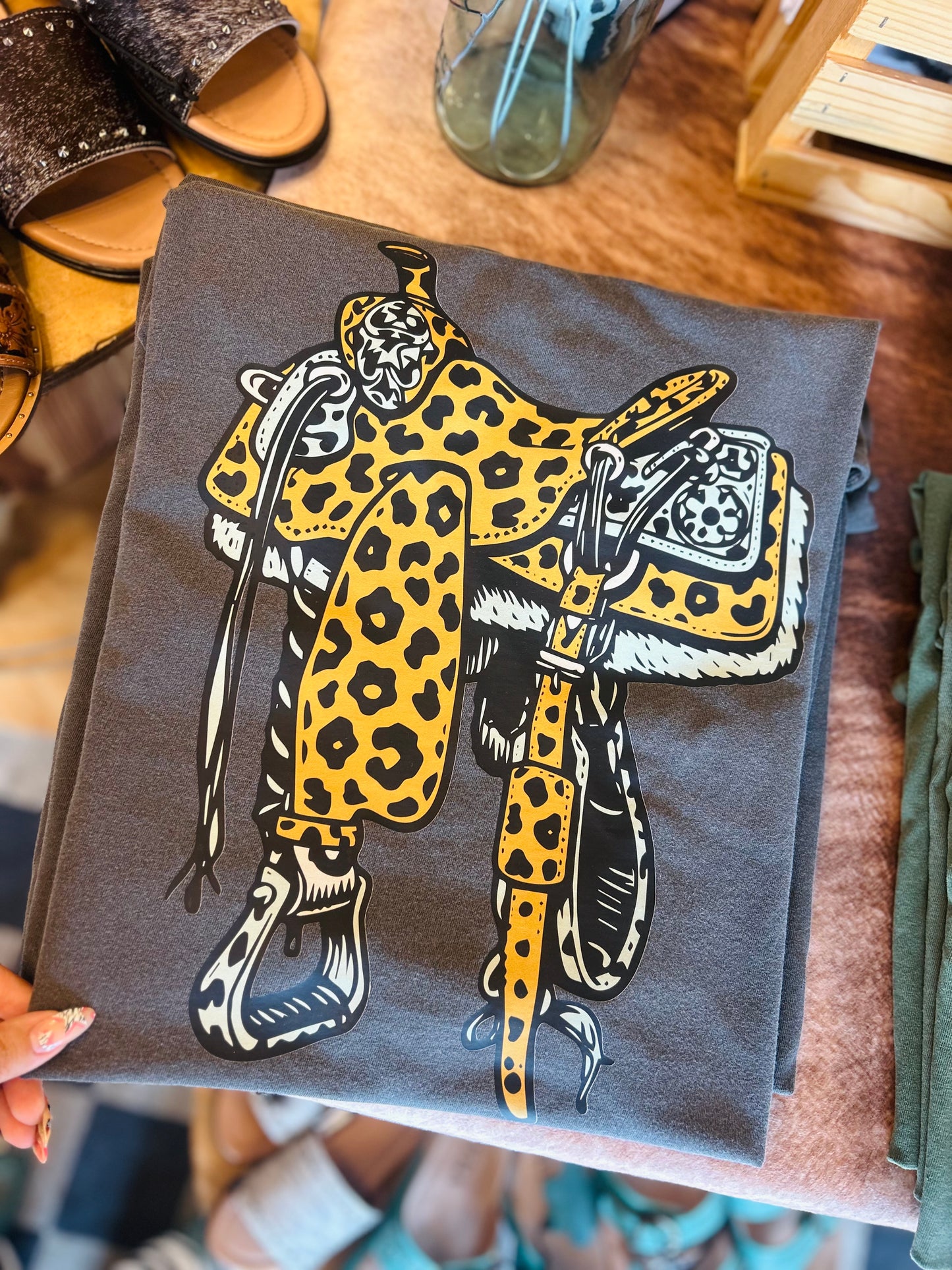 Punchy saddle tee
