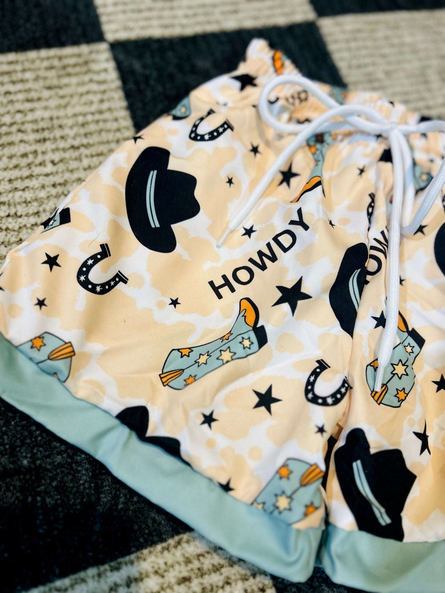 Howdy swim trunks