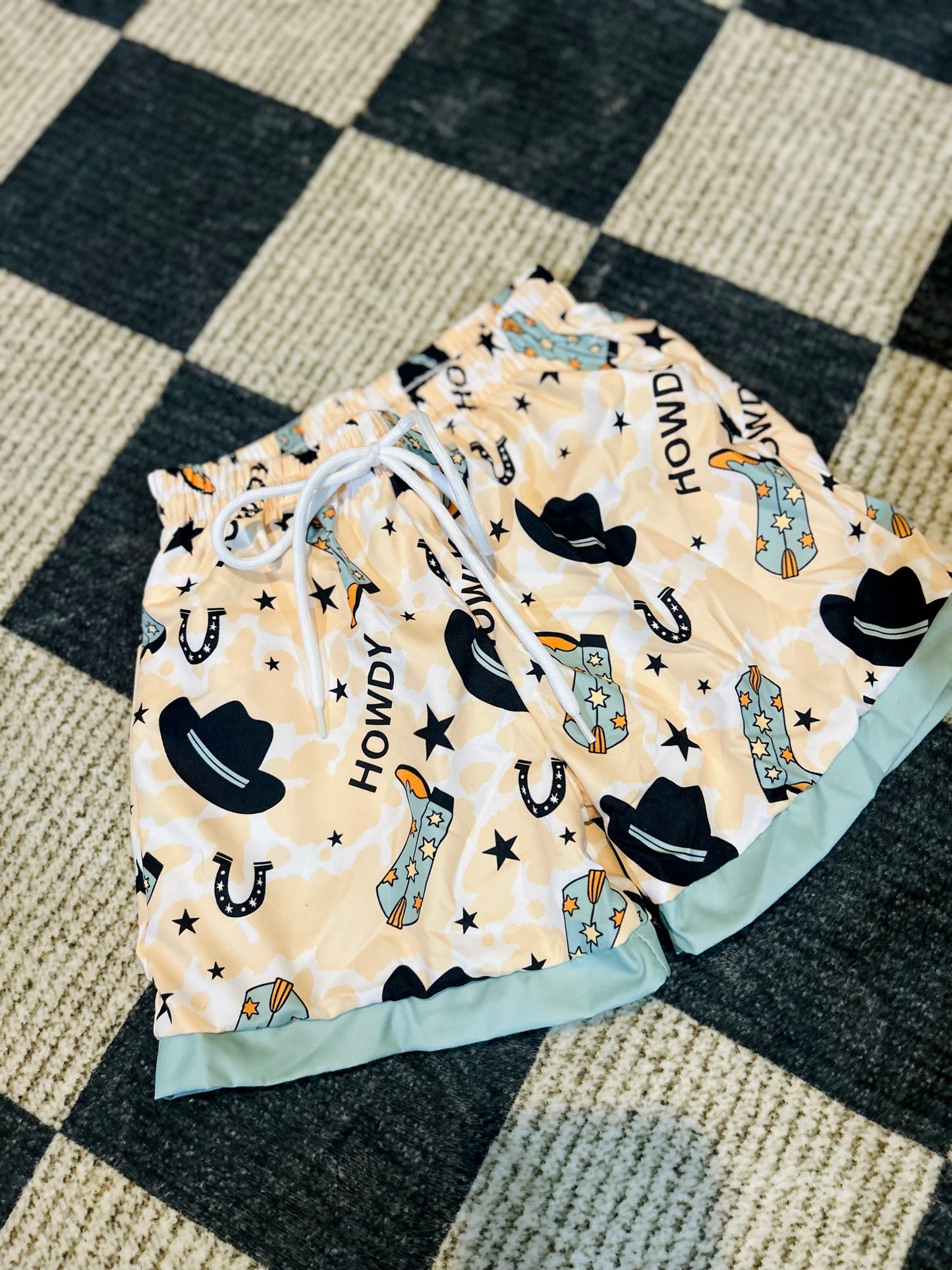 Howdy swim trunks
