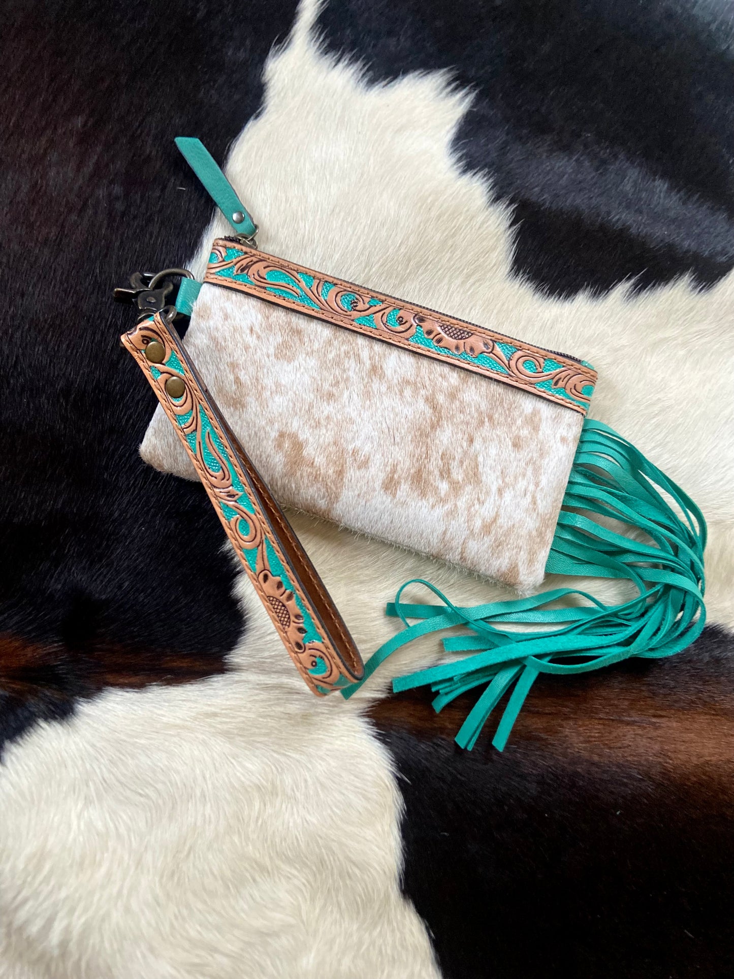 Ruby cowhide wristlet