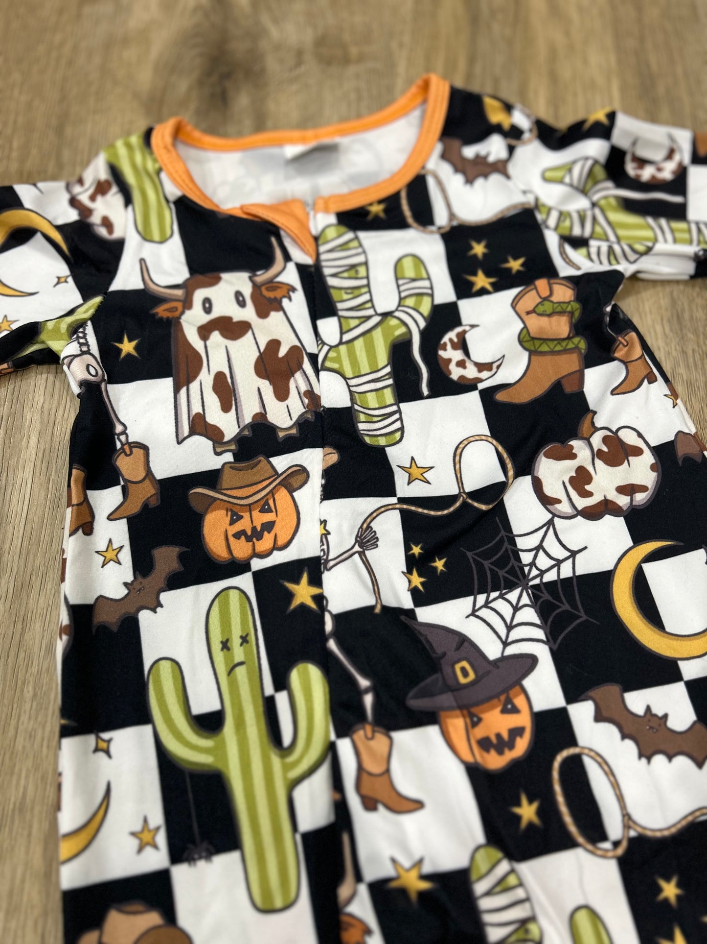Spooky western onesie